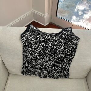 Cute waist length top can be dressed up or down. Smoke free home
